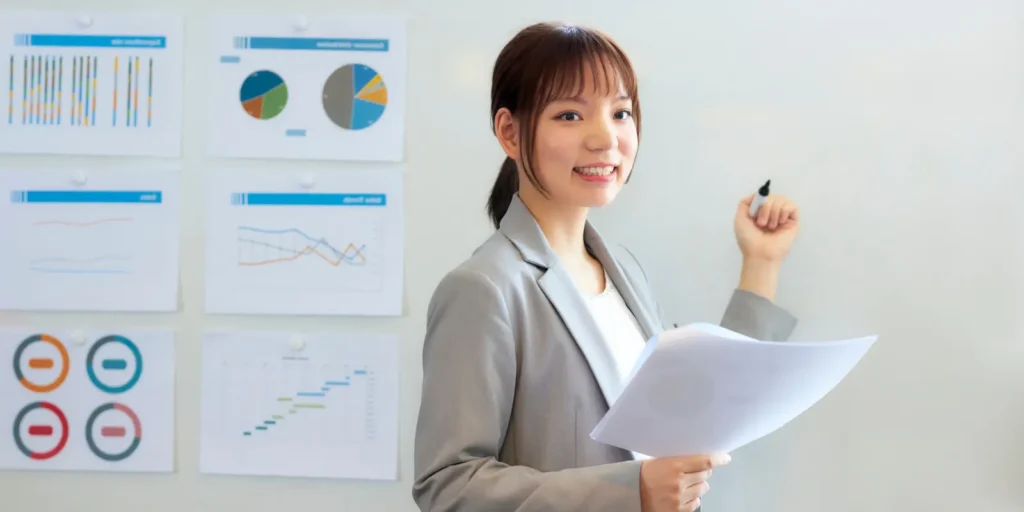 Professional woman analyzing healthcare data and email marketing analytics on tablet while building custom mailing database for targeted business campaigns