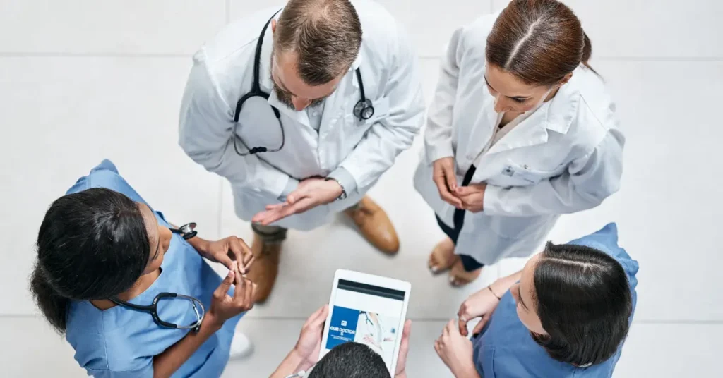 Team of medical geneticists collaborating on building a comprehensive email database.