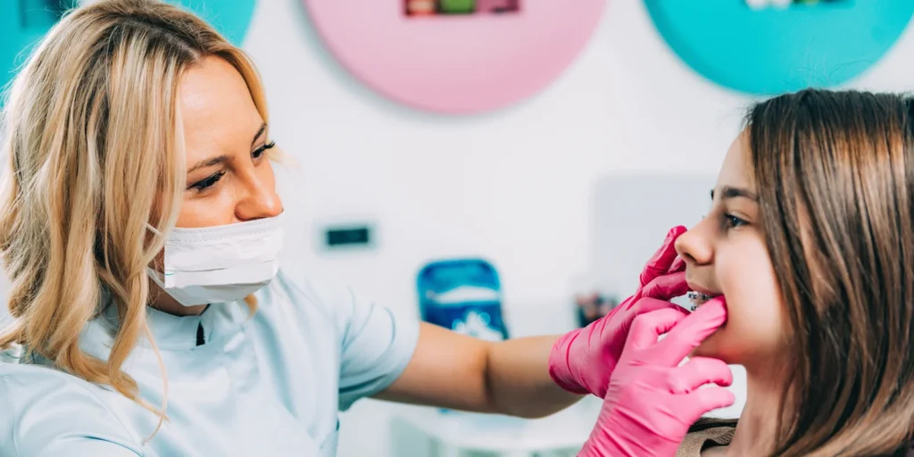 Healthcare professionals collaborating in an office setting to create a verified orthodontist email database for targeted dental marketing in the USA