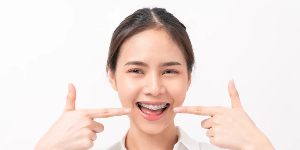 Smiling professional gesturing customization, symbolizing tailored orthodontist mailing lists for targeted dental marketing strategies in the USA
