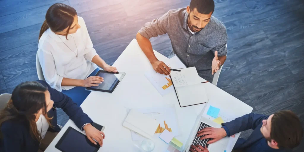 Marketing team strategizing outreach campaign using a hematologist email list.