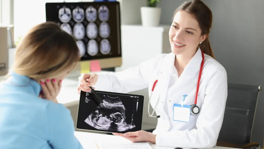 Doctor explaining X-ray results to a patient during a medical consultation