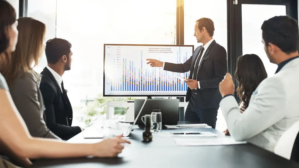 Endodontist business professionals discussing email marketing strategy using comprehensive endodontists email list for growth