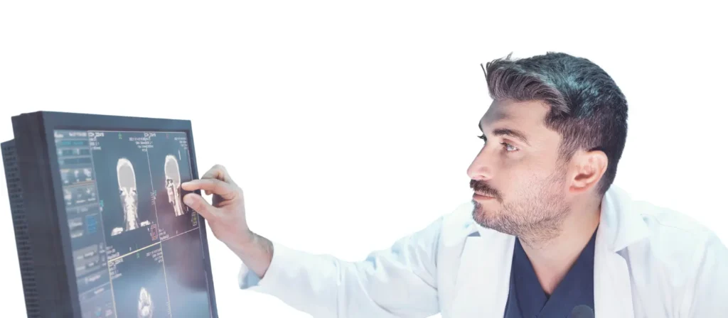 Male radiologist interacting with a digital imaging screen in a diagnostic lab.