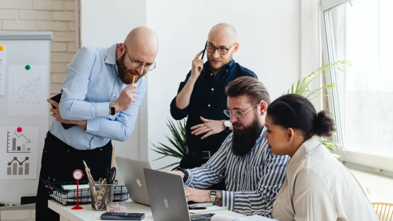 Business professionals analyzing CIO executive email data for targeted B2B marketing campaigns