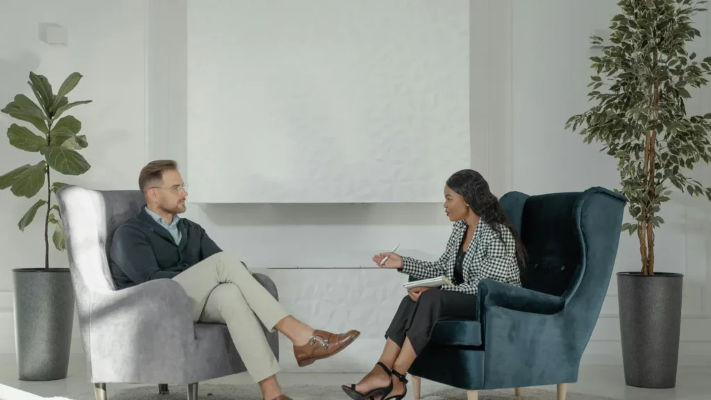 Psychologist consulting with a patient in a modern office, Understanding the Psychologist Email List