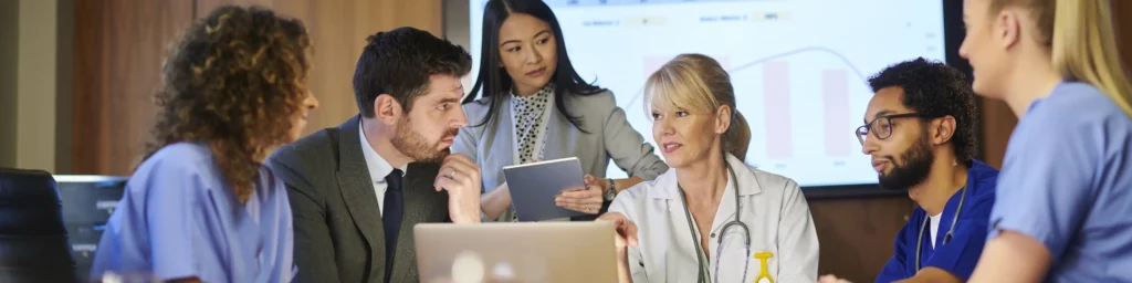 Use cases for Hospital CFO email marketing showing healthcare executives collaborating on financial strategy