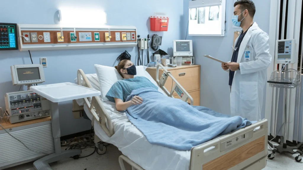 Neurology nurse discussing patient care in hospital setting