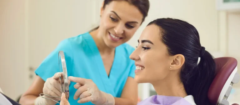 Dental pathologist consulting patient, representing Florida Oral Pathologists Email List for specialist outreach.